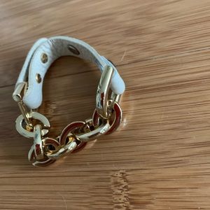 Golden and leatherette chain bracelet